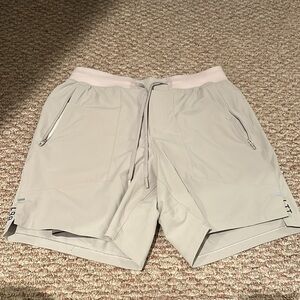 Lululemon License to Train Short 7 inch lined in beige khaki color
